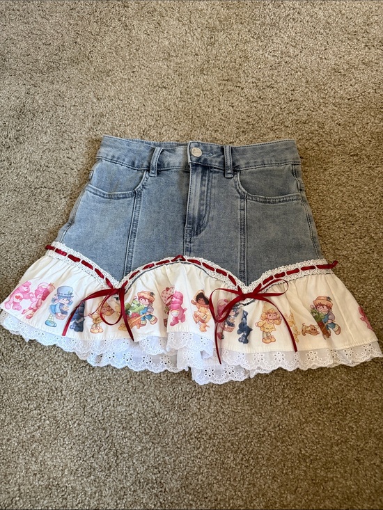 Dolls Kill Dresses & Skirts - Dolls Kill Blue Denim Mini Skirt with White Ruffle and Multicolor Print